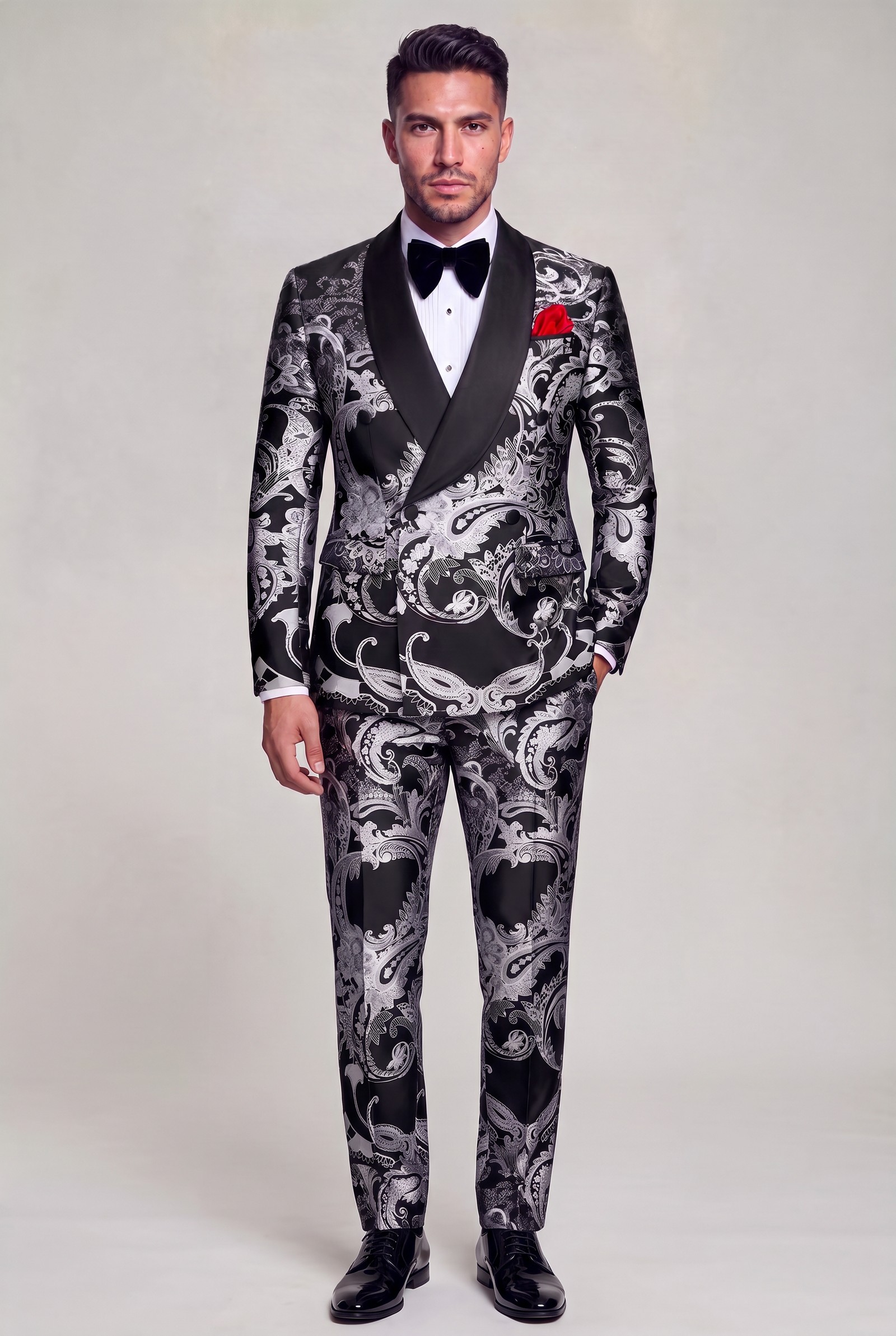 Full-length double-breasted black and silver tuxedo with matching paisley trousers
