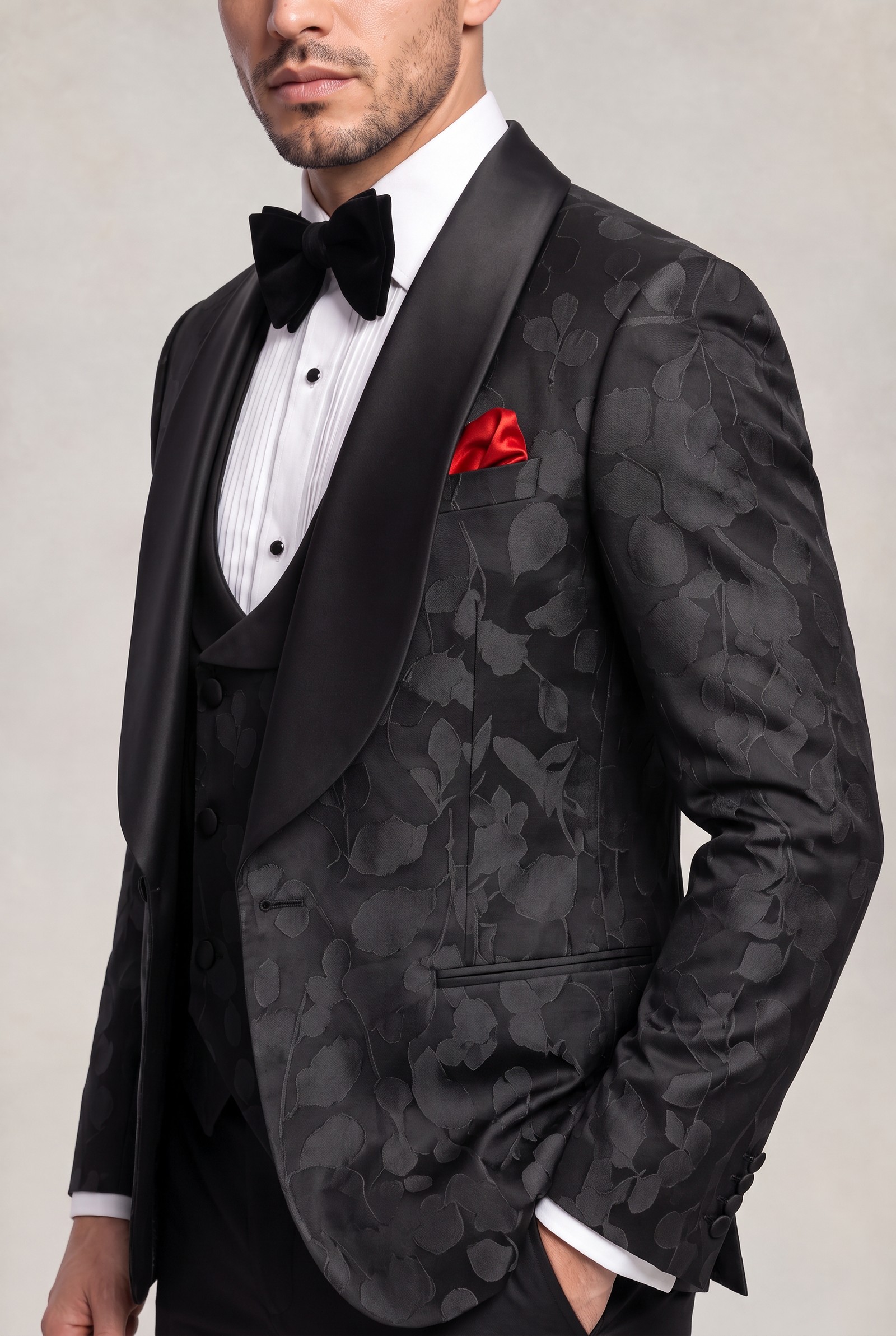 Close-up of locust leaf jacquard tuxedo with satin shawl lapel and red pocket square