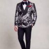 Full-length black and silver tuxedo with solid black trousers and polished shoes