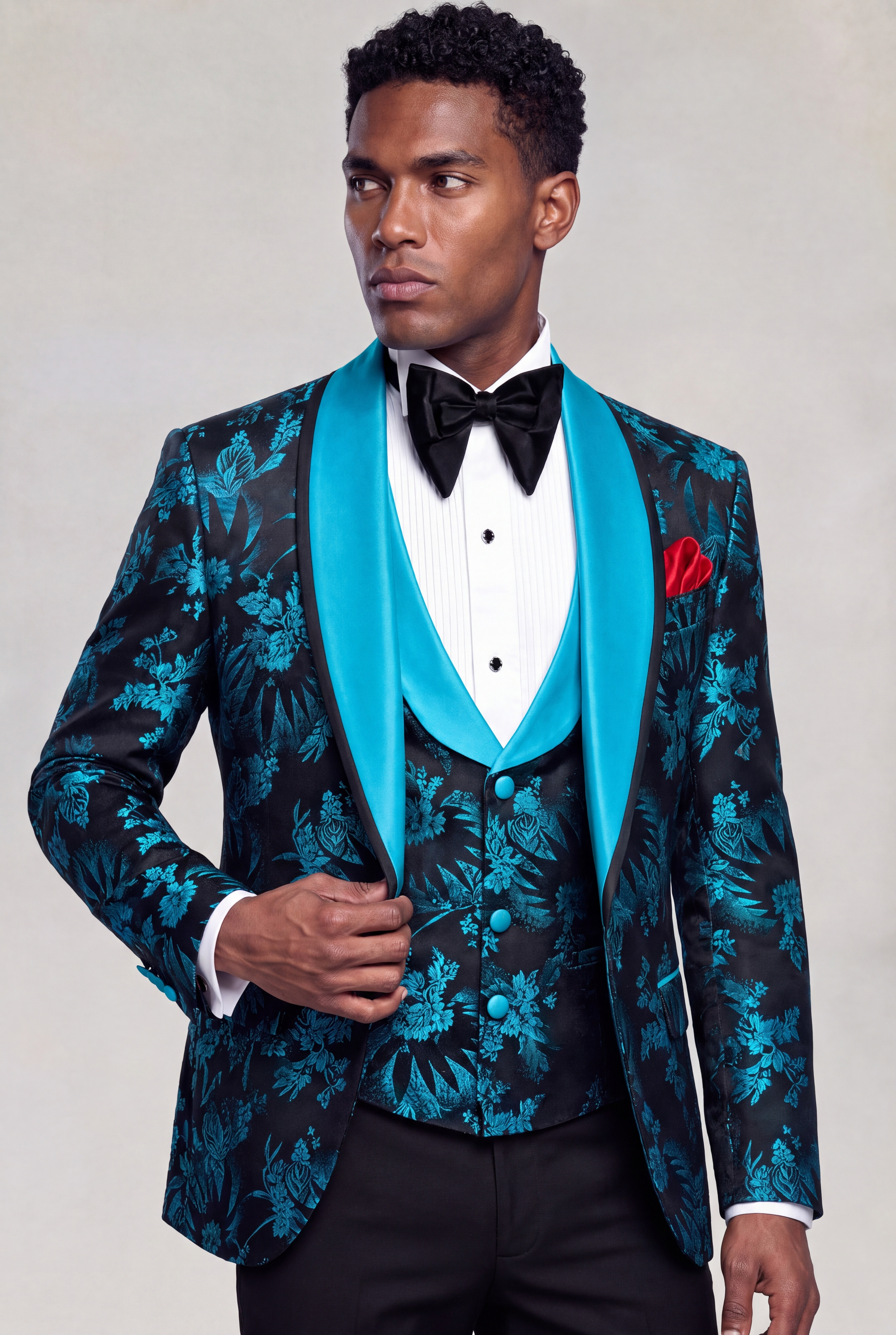 Side pose showing the turquoise satin lapels and black patterned dinner jacket from Gentleman's Guru