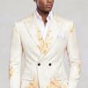 Men’s cream floral double breasted suit with matching trousers, peak lapels and an open-collar white shirt from Gentleman’s Guru