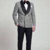 Grey houndstooth double-breasted tuxedo jacket with solid black pants, full-length view