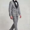 Side walking view of grey houndstooth tuxedo and matching trousers