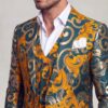 Close-up of baroque floral peak lapel and white pocket square