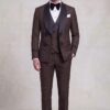Front standing view of a dark brown diamond three-piece tuxedo with matching trousers
