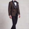 Dark brown tuxedo jacket and matching vest worn with solid black trousers, full-body view