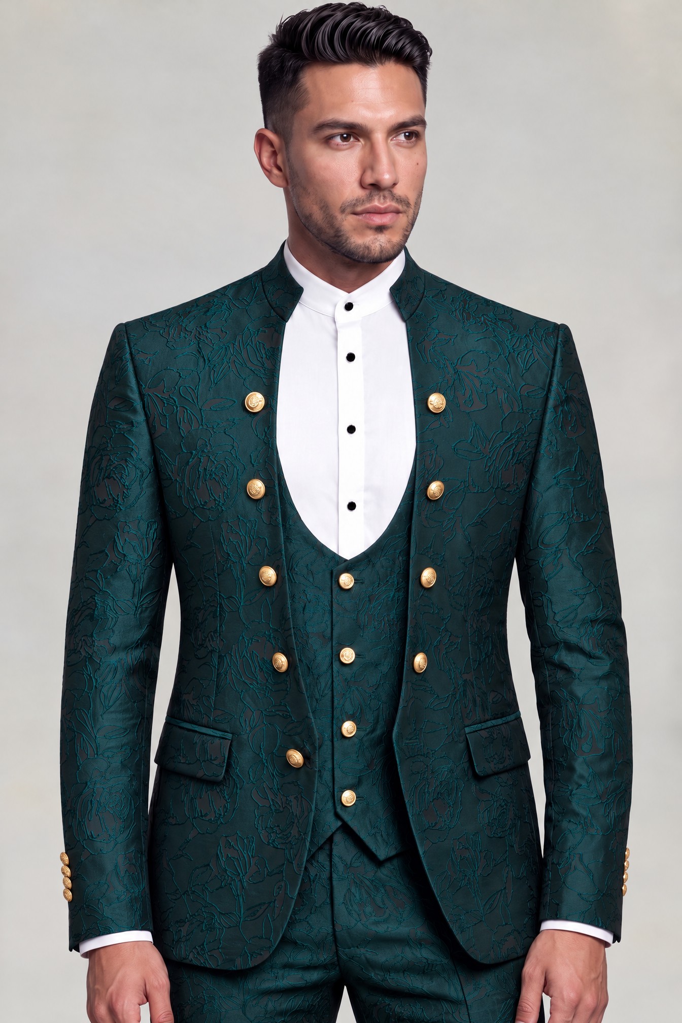 Dark teal abstract groom suit with ten gold jacket buttons and matching vest