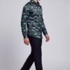 Men’s black and green paisley shirt full-body walking pose