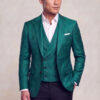 Teal green floral jacket and matching waistcoat styled with solid black dress pants