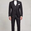Full-length black floral mandarin collar suit with matching patterned trousers
