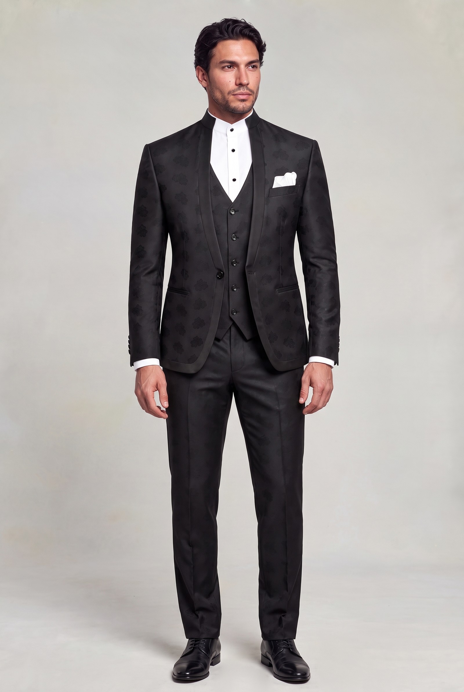 Full-length black floral mandarin collar suit with matching patterned trousers