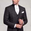 Three-quarter front view of a black floral mandarin collar suit