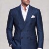 Dark blue floral jacket with open white shirt and plain black trousers