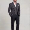 Full-length dark grey plaid jacket and vest with plain black trousers and open white shirt