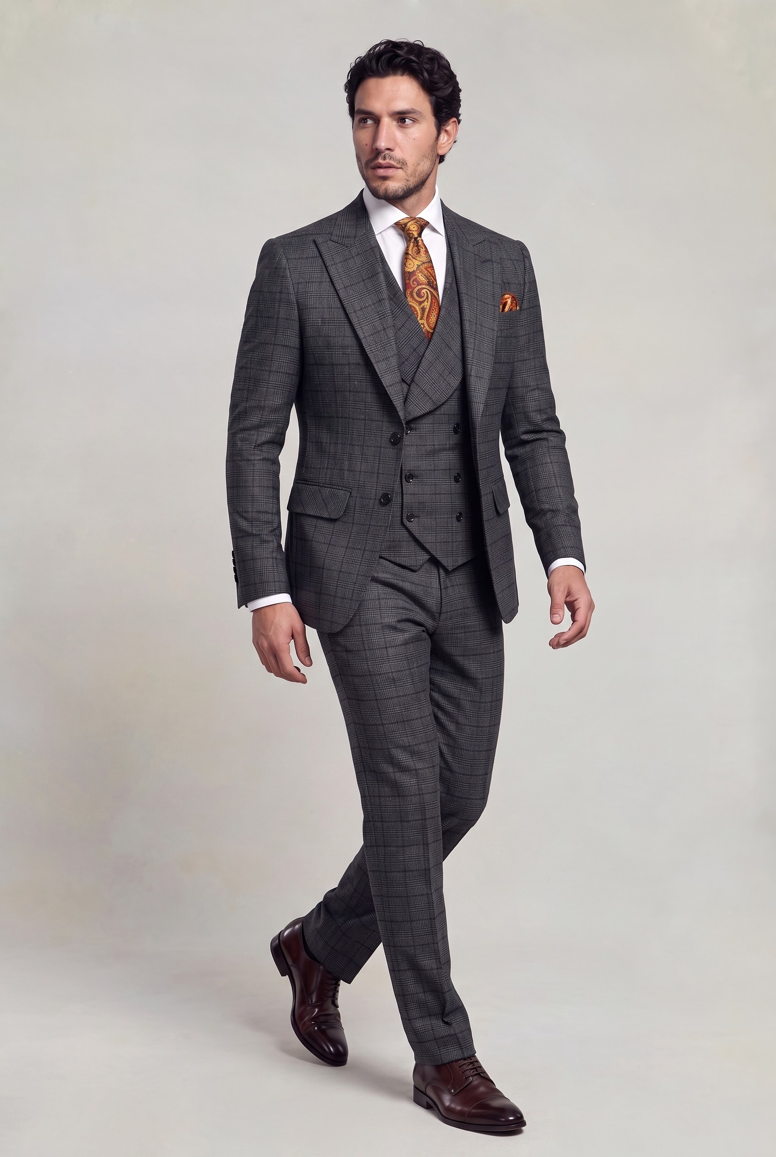 Full-length dark grey plaid three-piece suit with matching trousers