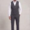 Full-length plaid vest and matching trousers with open-collar white shirt