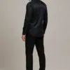 Men's black paisley wedding guest shirt shown full length from the back from Gentleman's Guru