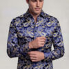 Men's navy blue and gold paisley shirt cuff pose from Gentleman's Guru