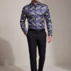 Men's navy blue and gold paisley shirt full-body walking view from Gentleman's Guru