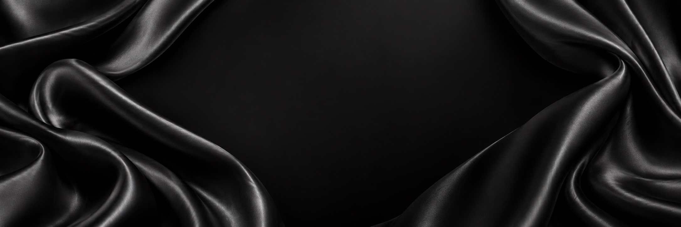 Smooth charcoal satin backdrop for men’s suits